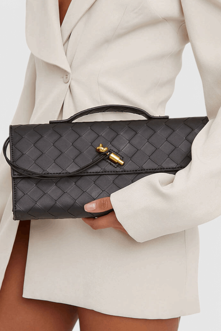Melanie | Cartera de mano con lazo dorado